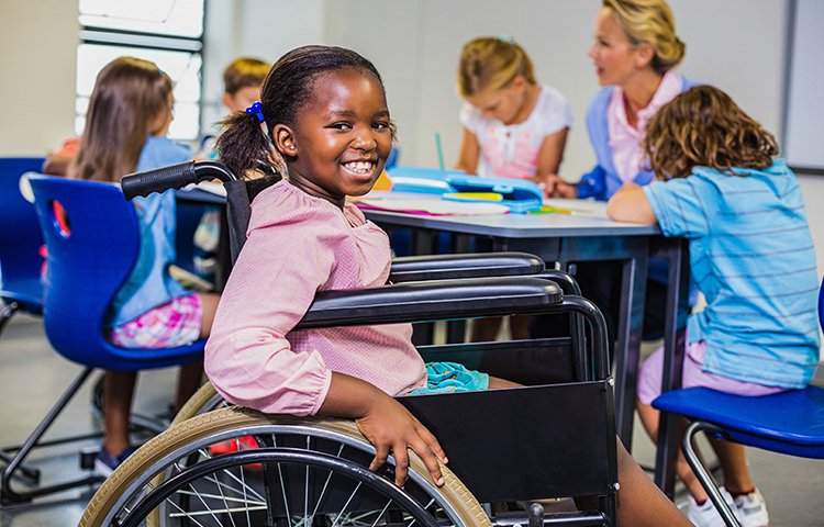 a girl in a wheelchair